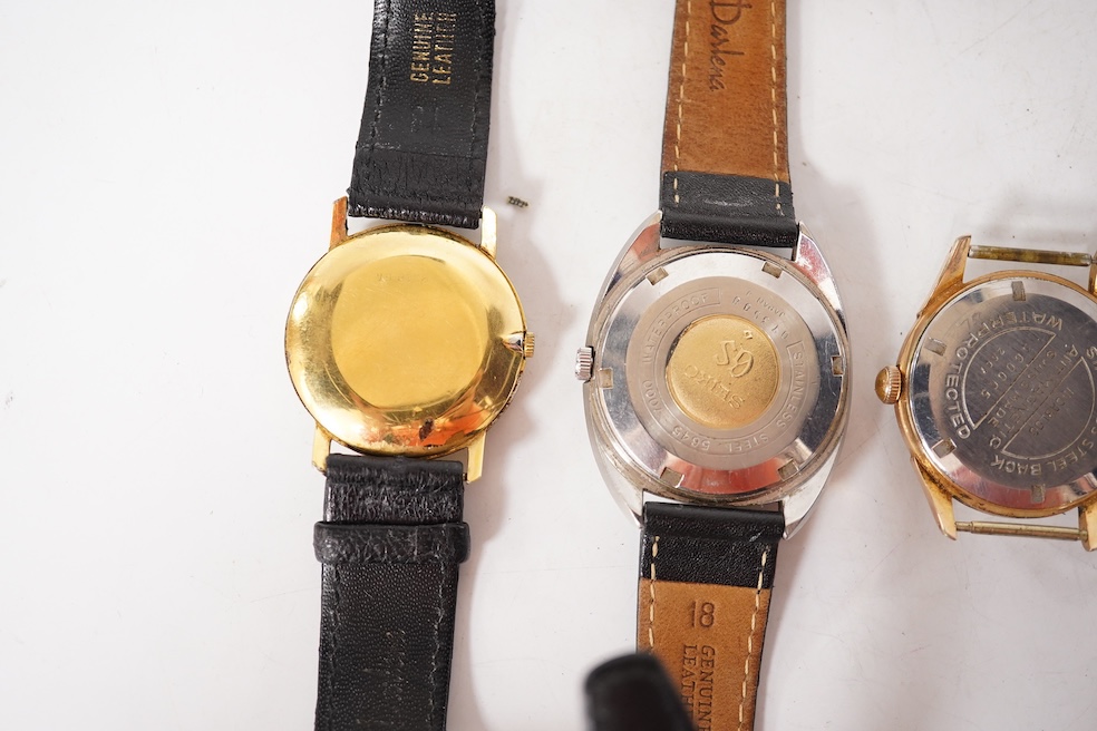 A gentleman's 1940's 9ct gold manual wind wrist watch(a.f.), together with four other wrist watches including Seiko, gold plated Girard Perregaux and Baume & Mercier Baumatic. Condition - poor to fair